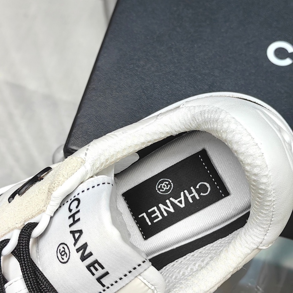 CHANEL Women’s Black and White Casual Sneakers - Picture 8 of 9